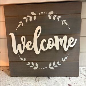 Gray Welcome Wall Sign with White Script